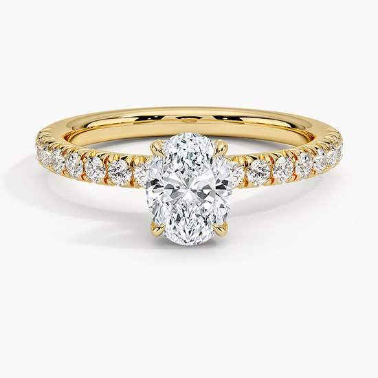 "Endless Sparkle – Oval Center Stone Ring with Diamond-Studded Band"